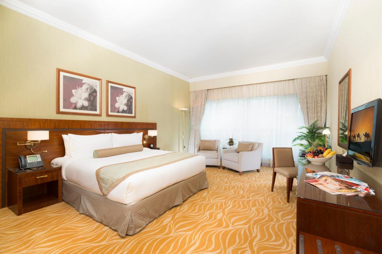 Grand Mercure Majlis Residences Абу Даби Екстериор снимка A room at the hotel