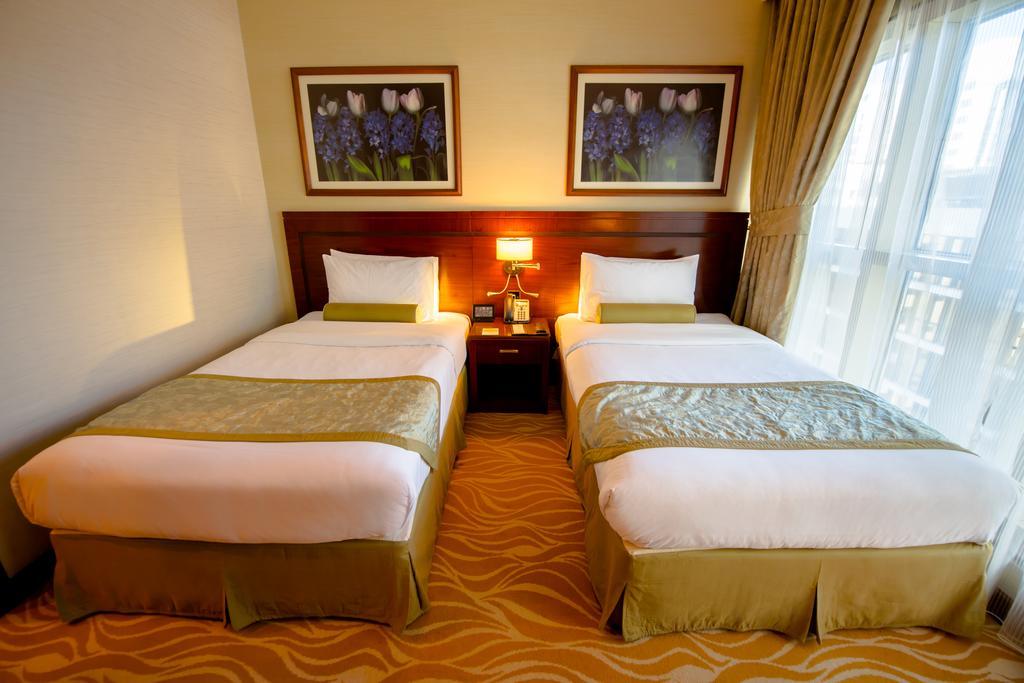 Grand Mercure Majlis Residences Абу Даби Екстериор снимка A room at the hotel